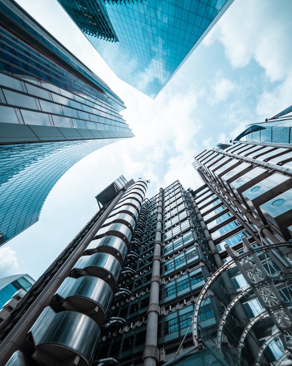 Upward view of modern skyscrapers in London, the centre of financial services consulting.